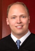 JUDGE Ryan D. Tenney